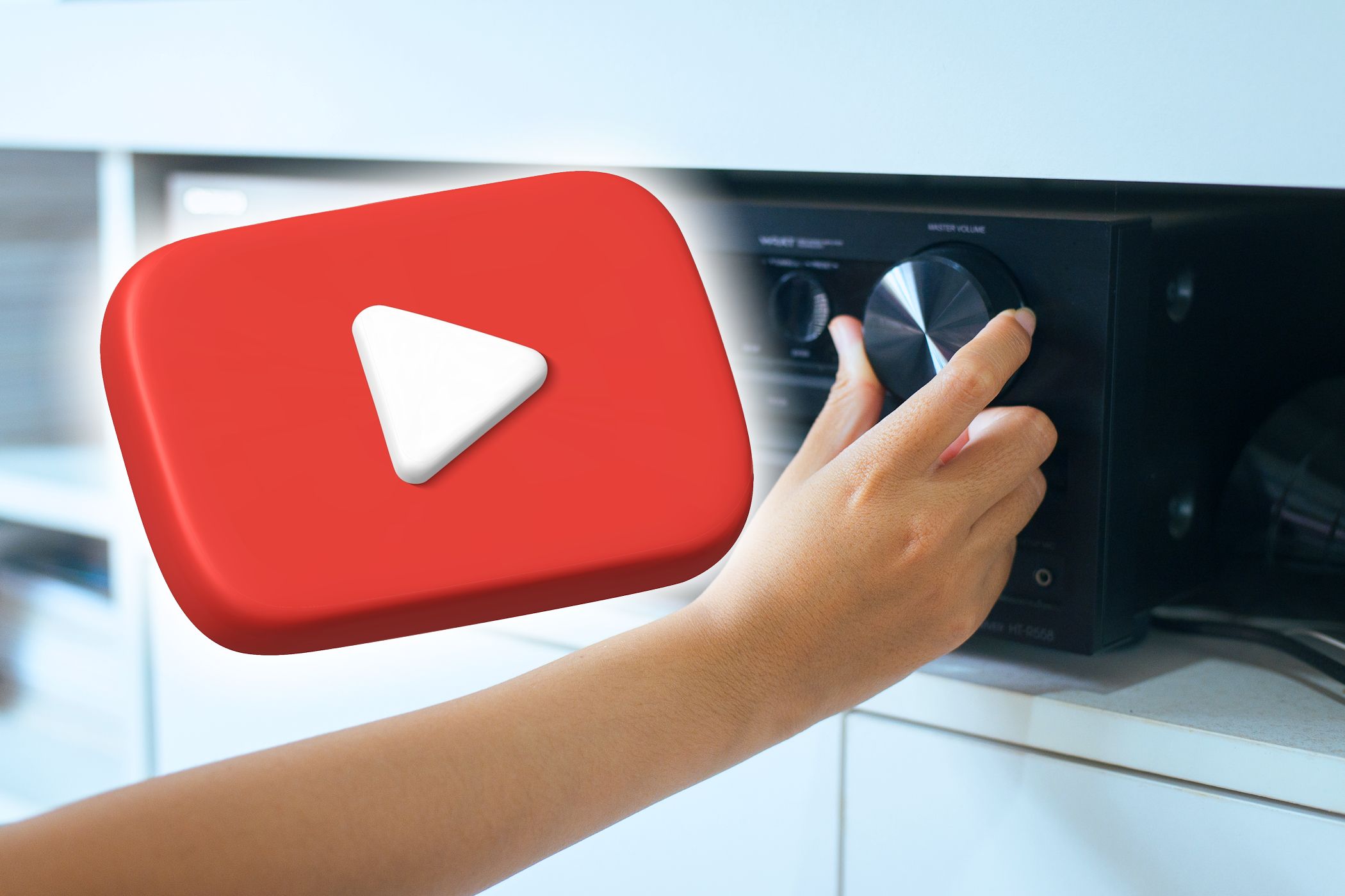 person turning down volume control with youtube logo