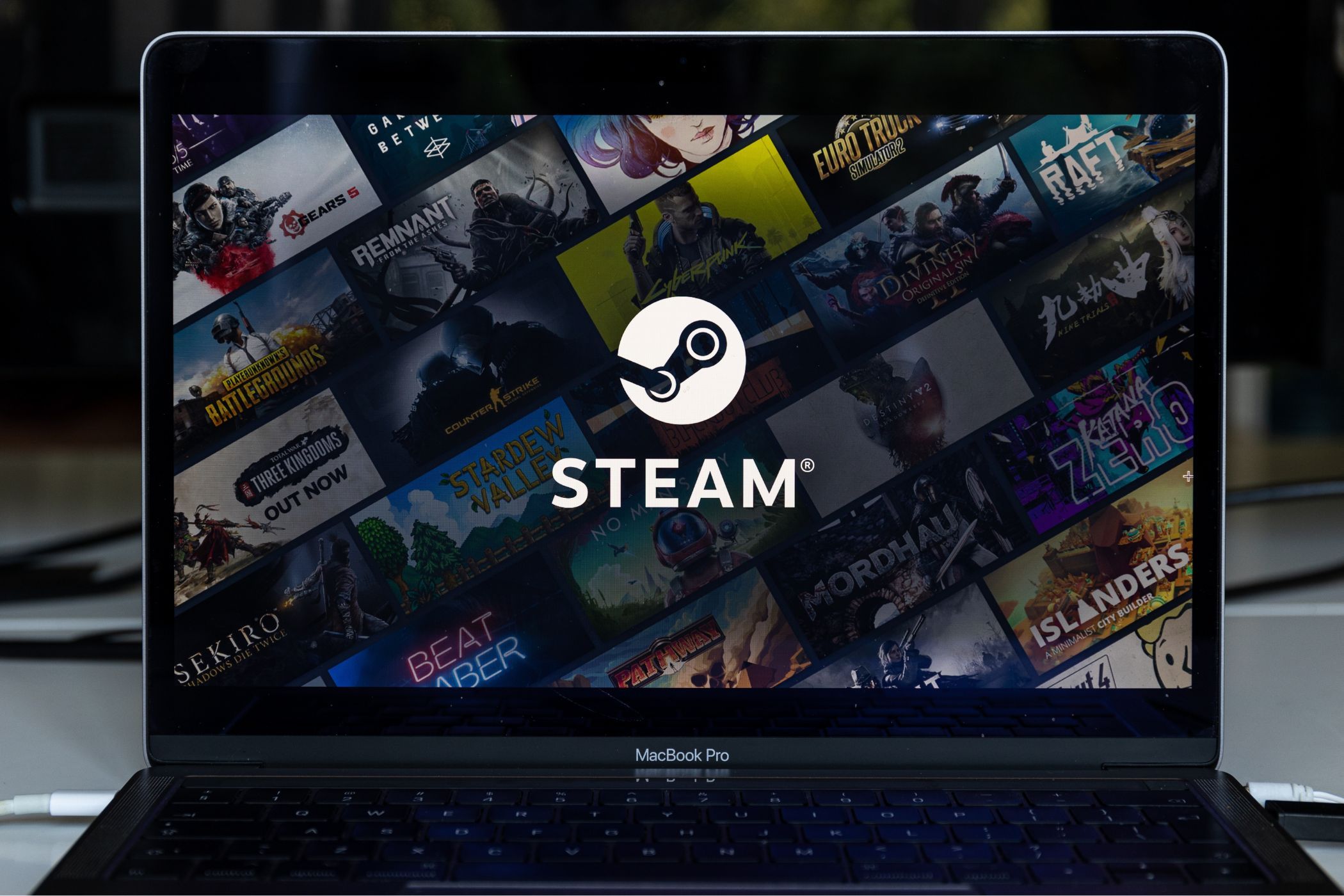 the steam logo on a laptop
