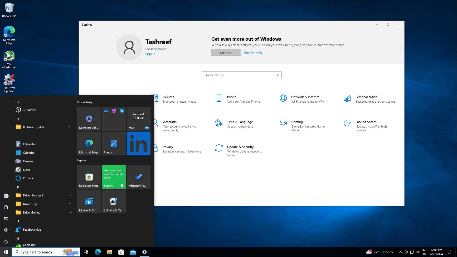 Windows 10 homescreen showing the settings app and the start menu open