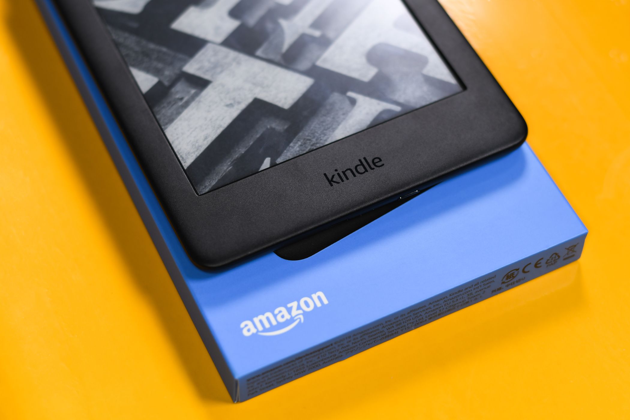 amazon kindle on yellow background