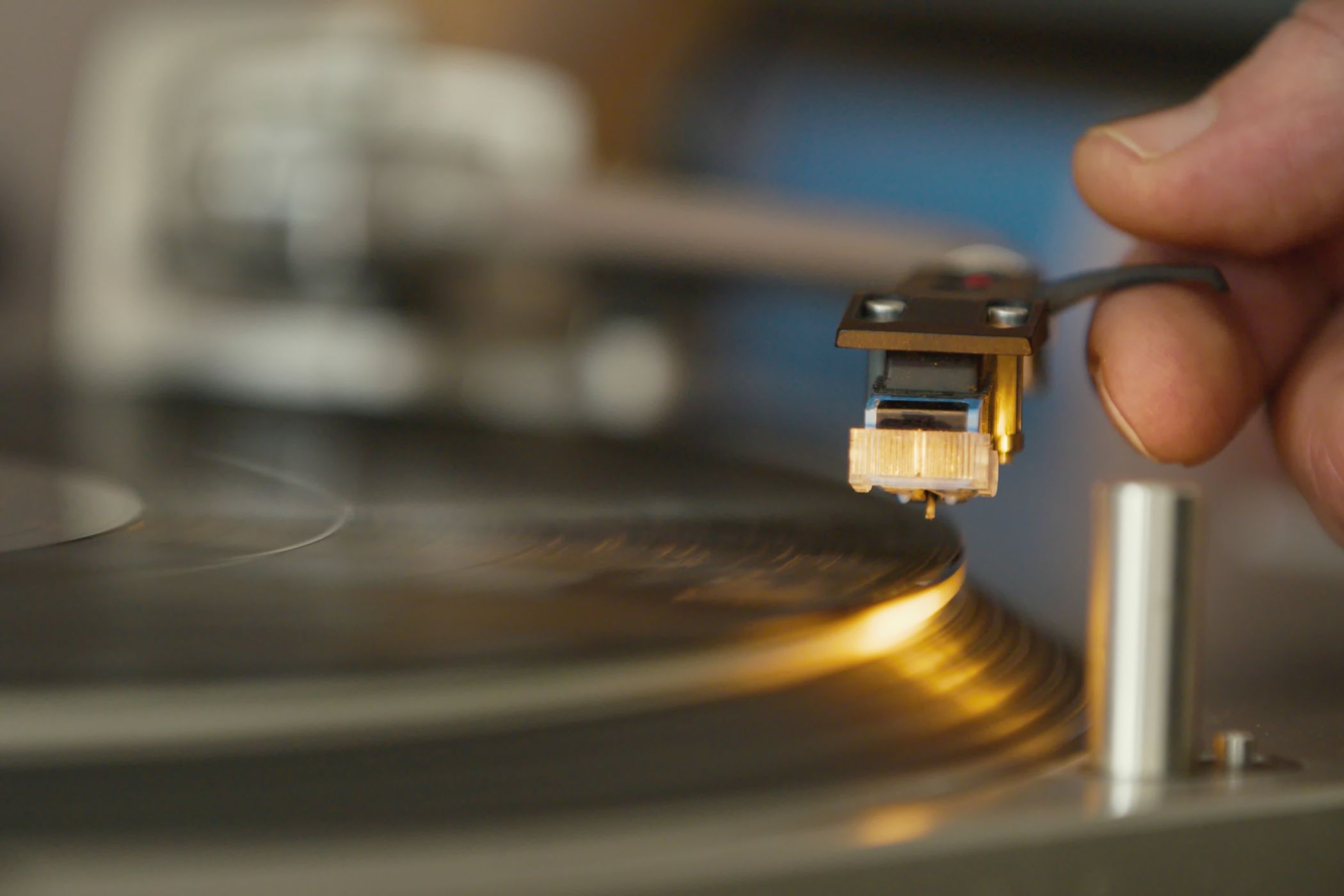 person playing vinyl record