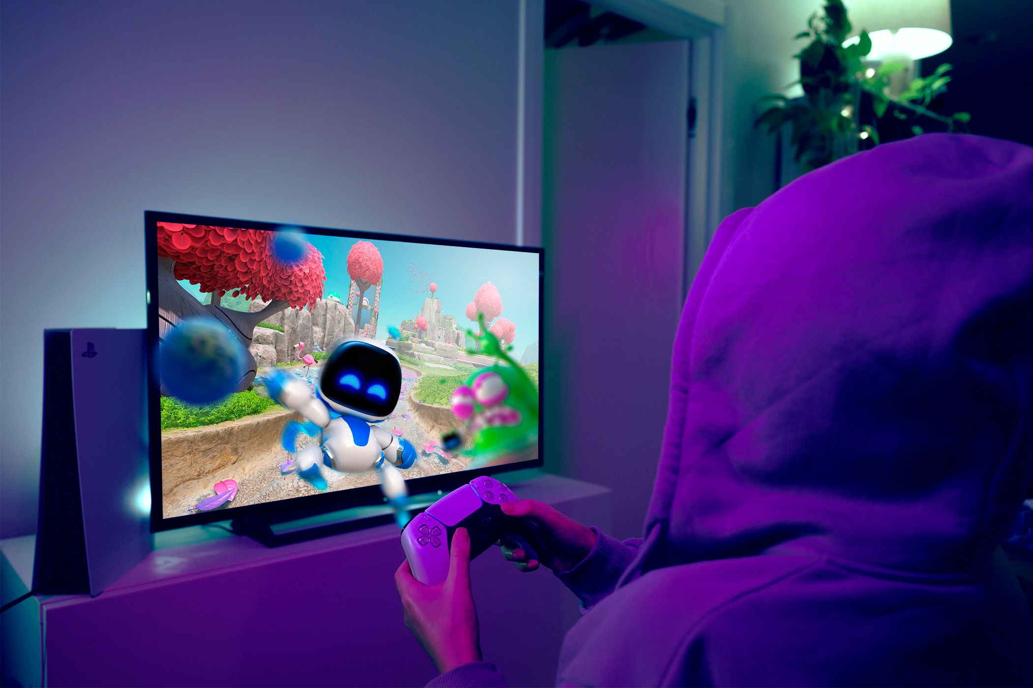 A person playing Astro Bot on a PS5.