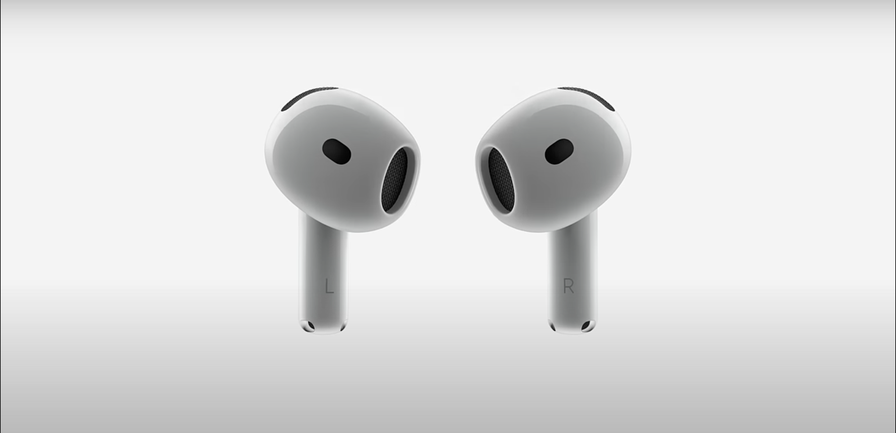 ساقه های AirPods 4 روی پس زمینه ساده نشان داده شده است