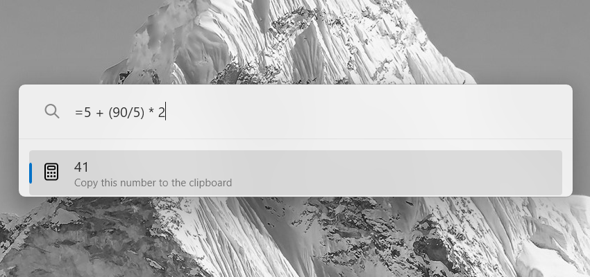 Using the calculator in PowerToys Run on Windows.