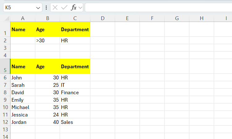 A criteria range added above the data range showing names, ages, and departments of employees in Excel.