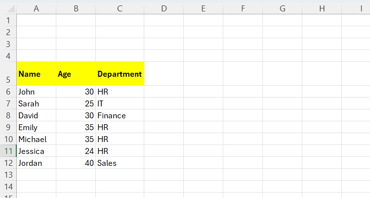 A data range showing names, ages, and departments of employees in Excel.