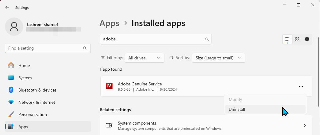 Uninstalling Adobe genuine service in Windows 11 Settings