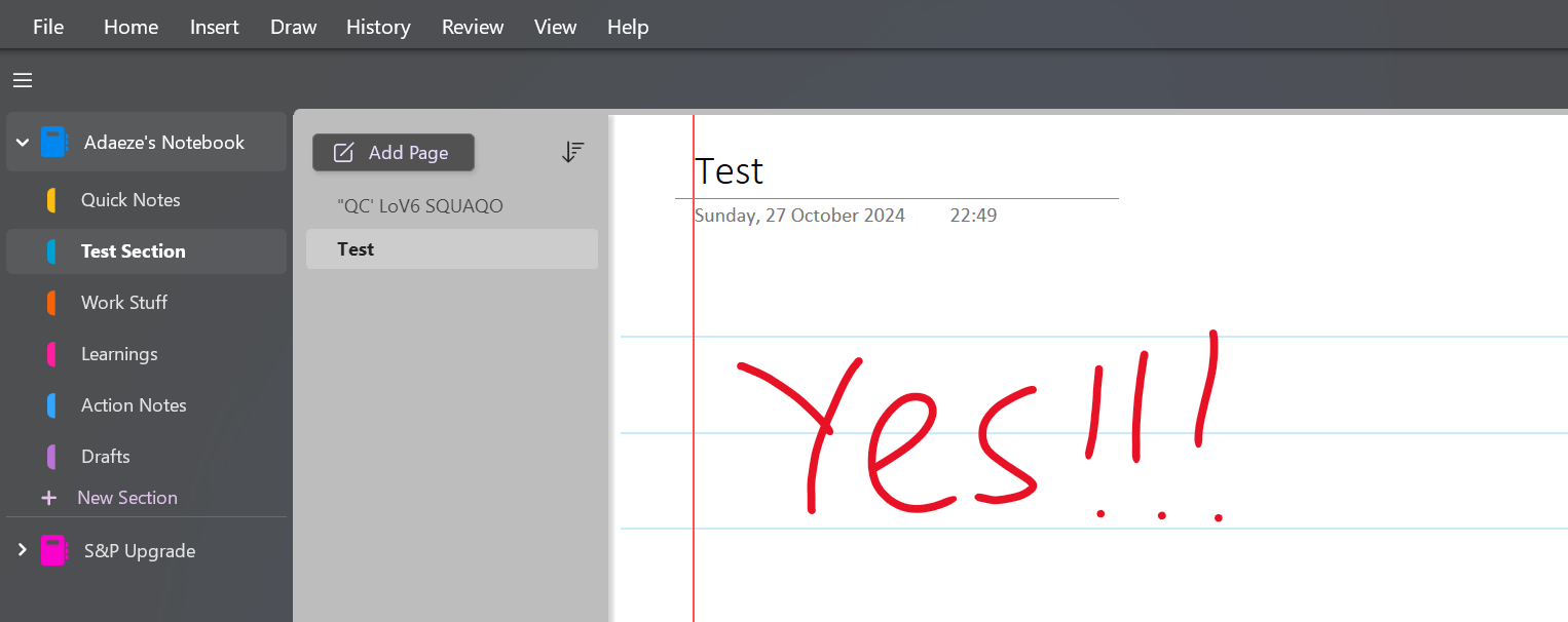 A OneNote page with the word yes handwritten in red ink