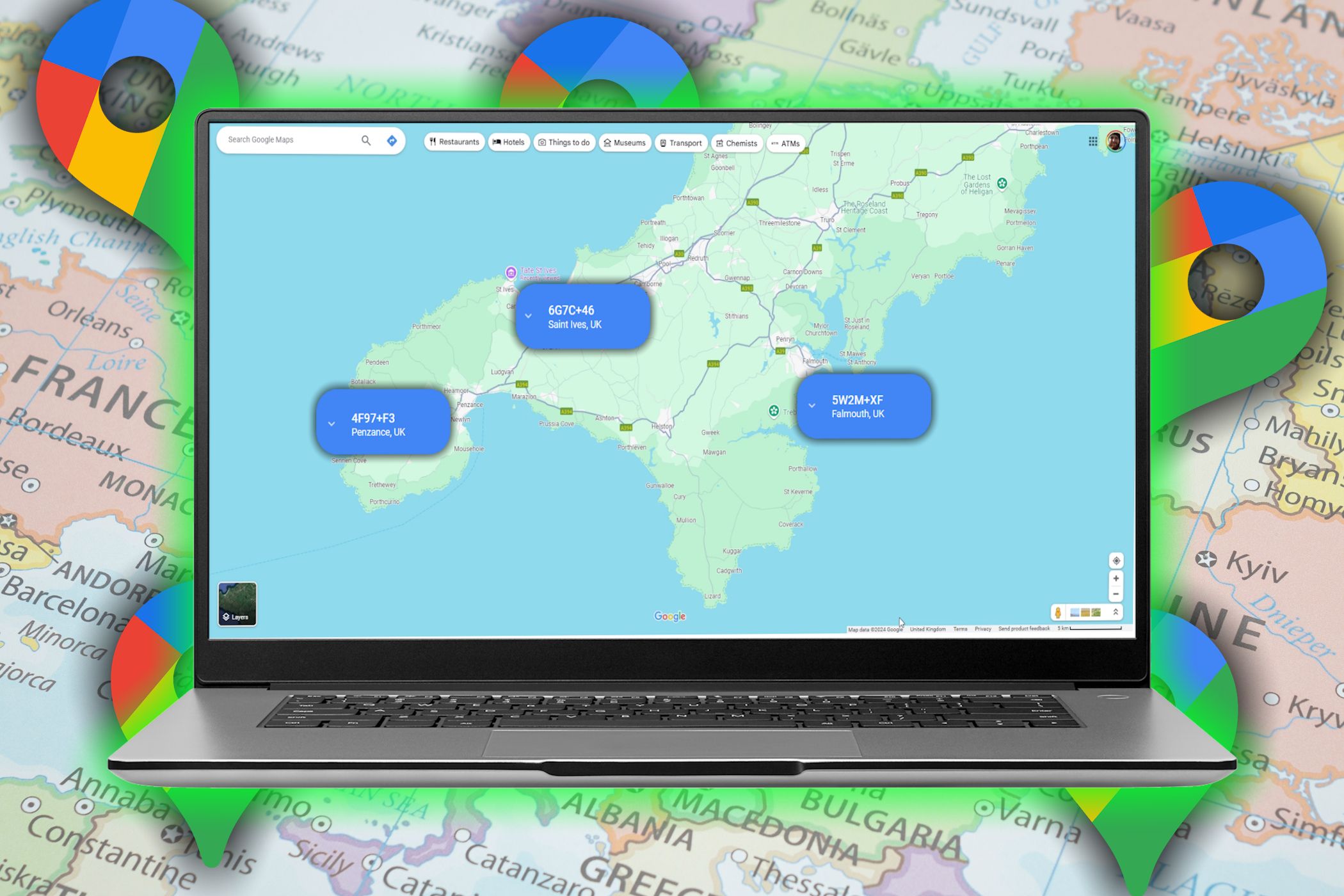 google maps plus codes on laptop screen with map background