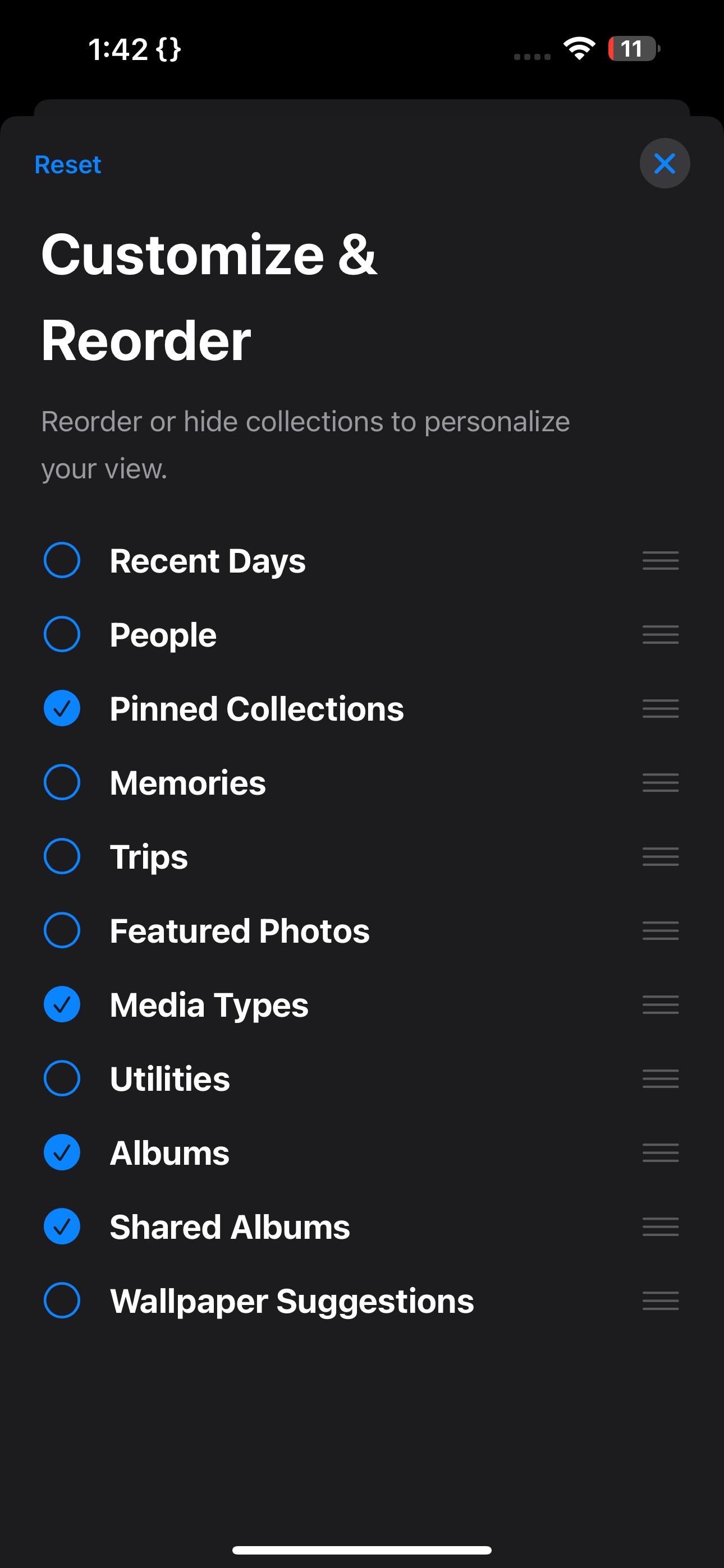 Reordering and hiding collections in the Customize and Reorder page in the Photos app on an iPhone