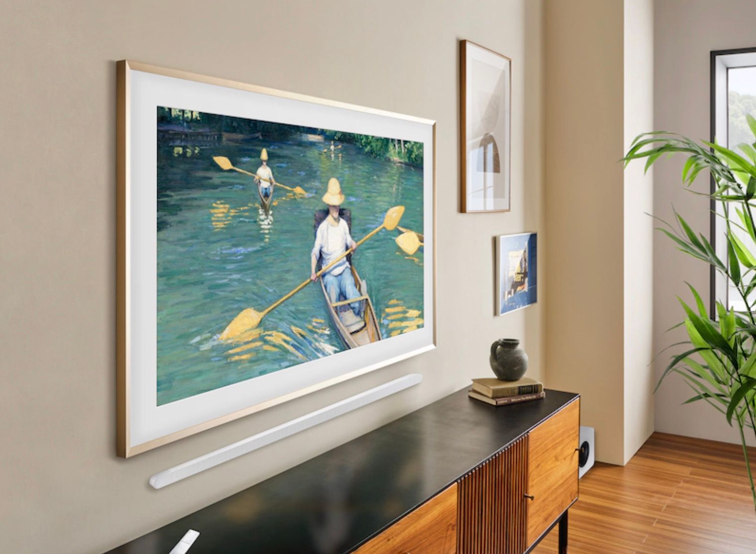 Samsung Frame TV on wall with art 