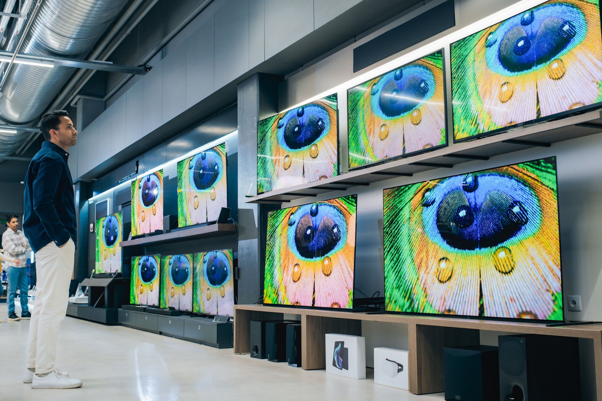 televisions on racks in store