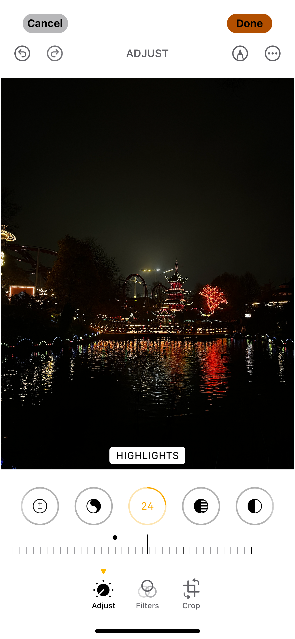 Editing the highlights in a nighttime photo on a smartphone