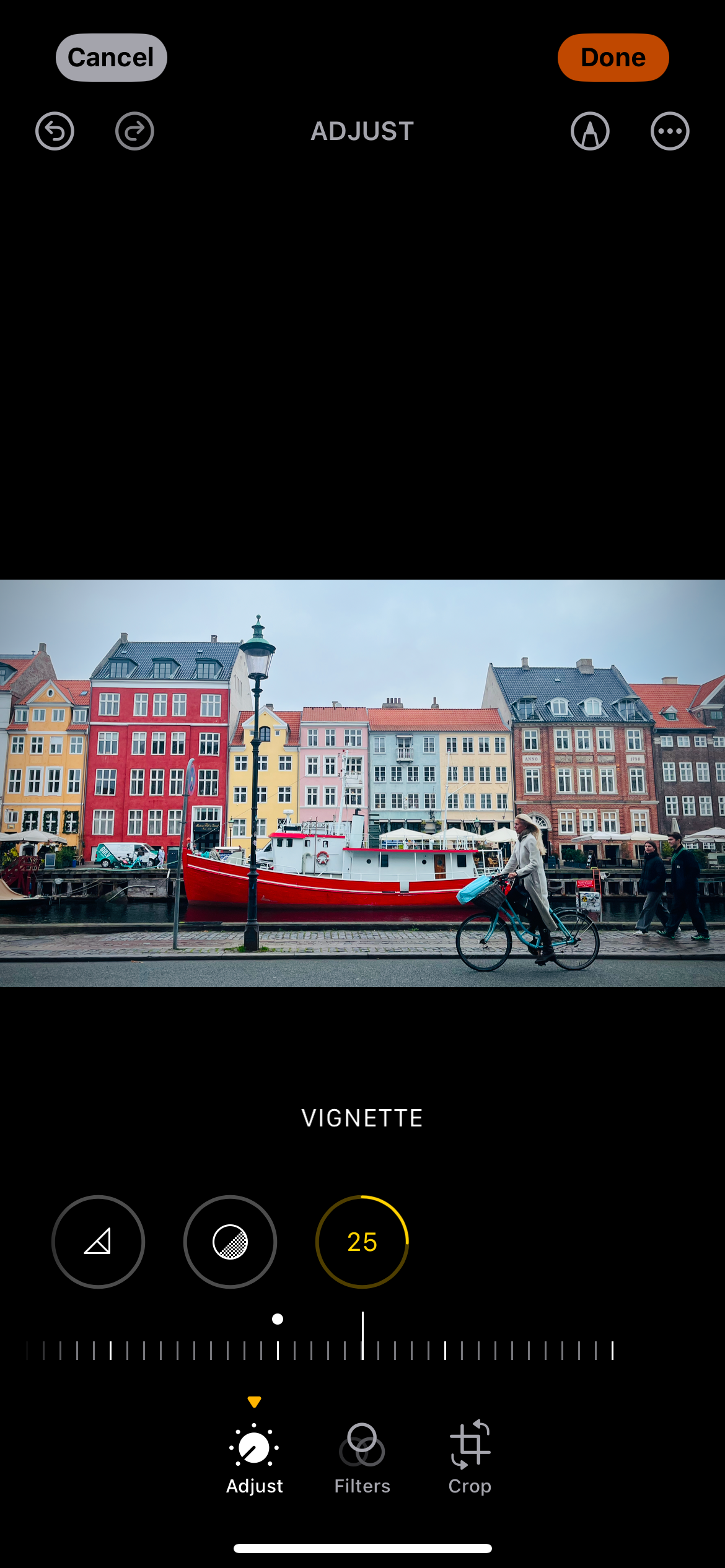 Adding street photography vignette to a picture involving a cyclist