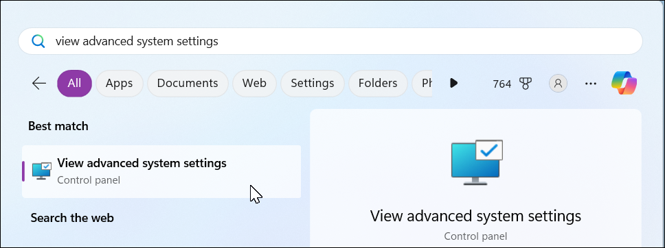 Windows 11 search bar open with view advanced system settings keyword