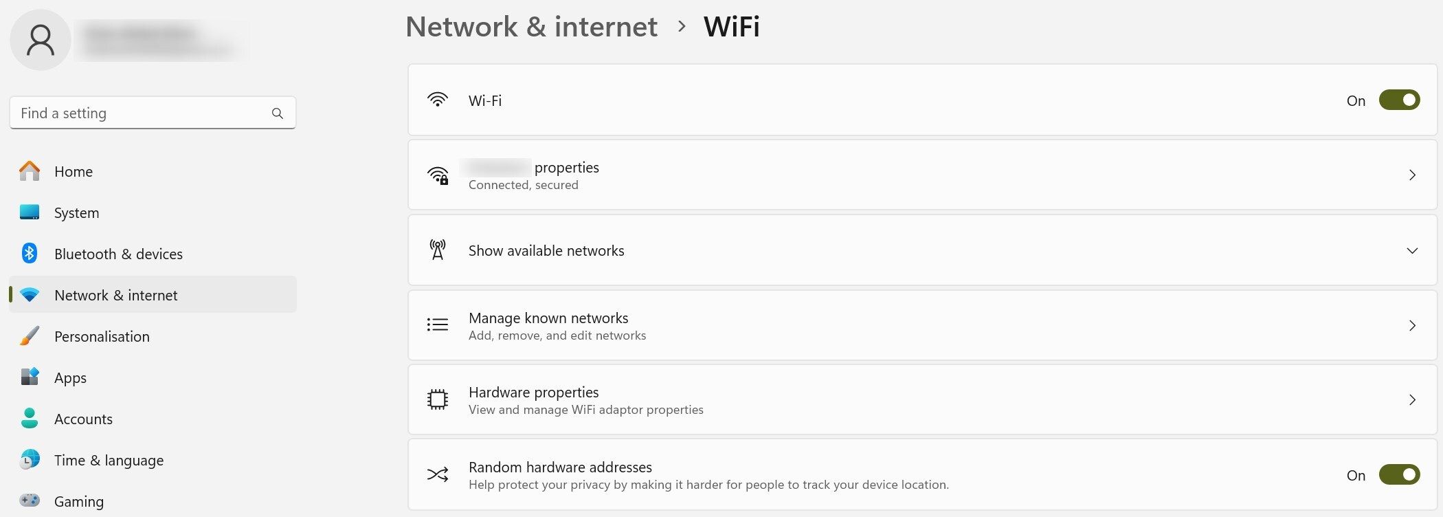 Turning on random hardware addresses toggle in Wi-Fi settings on Windows.