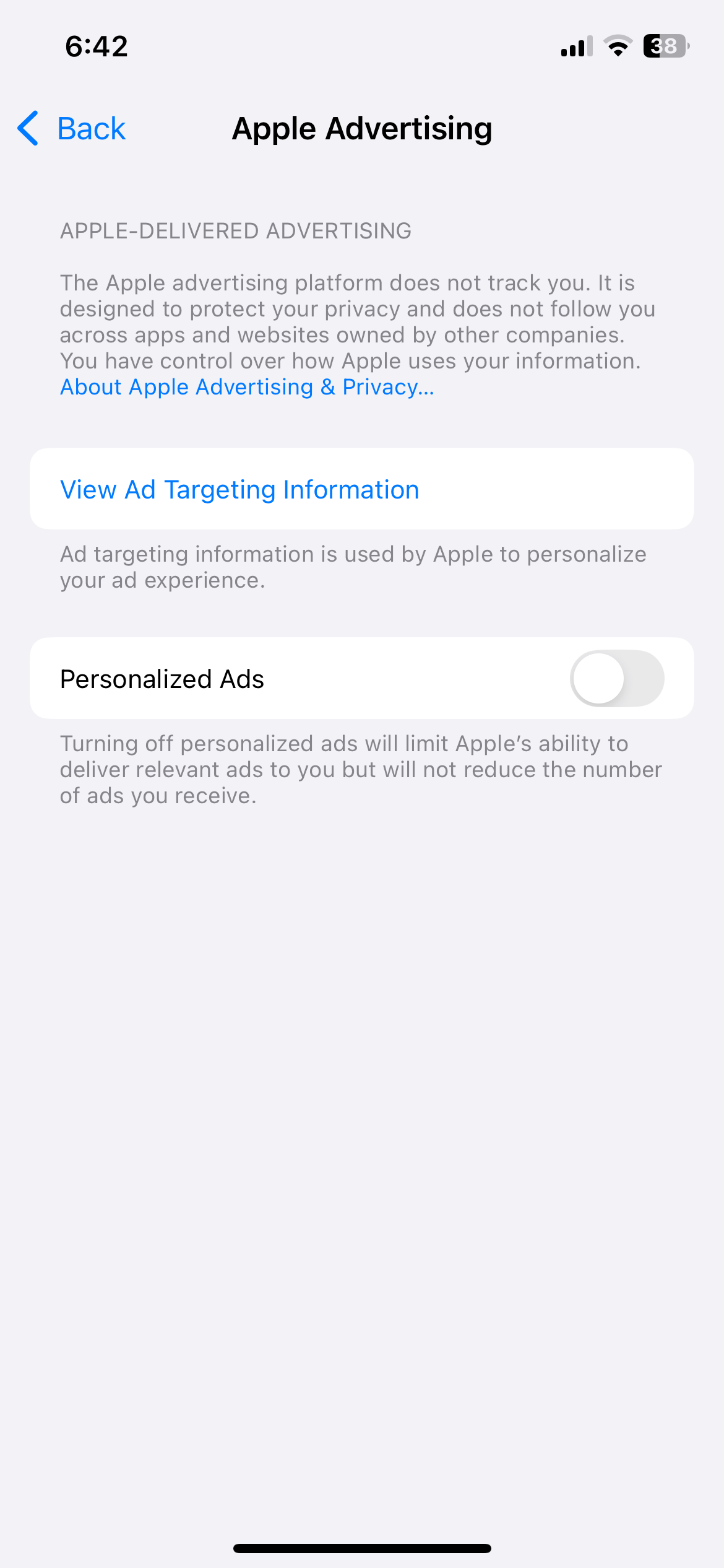 The iPhone's Settings app shows the Apple advertising menu