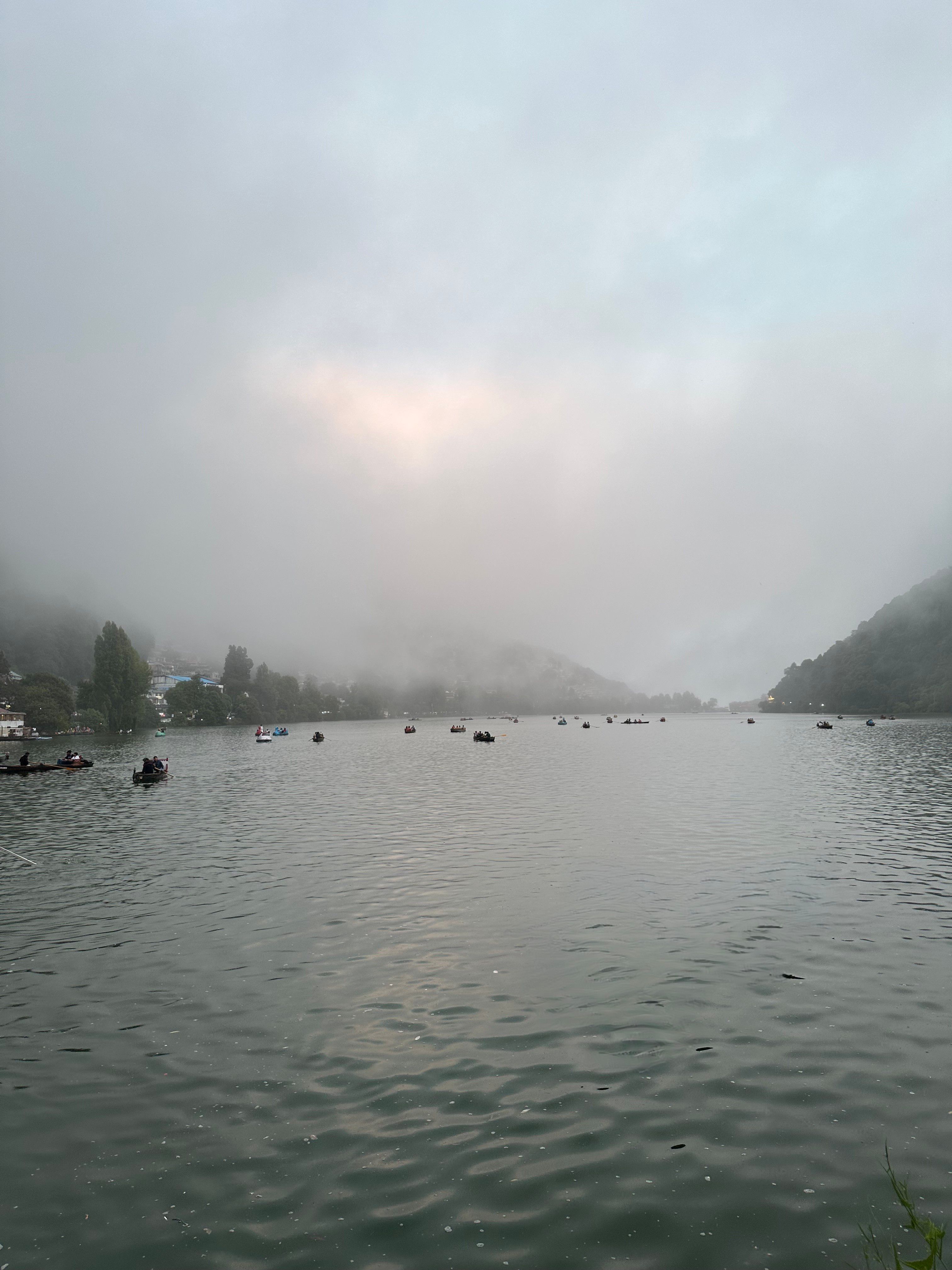 Serene lake view with boat in front edited on Pixel 9