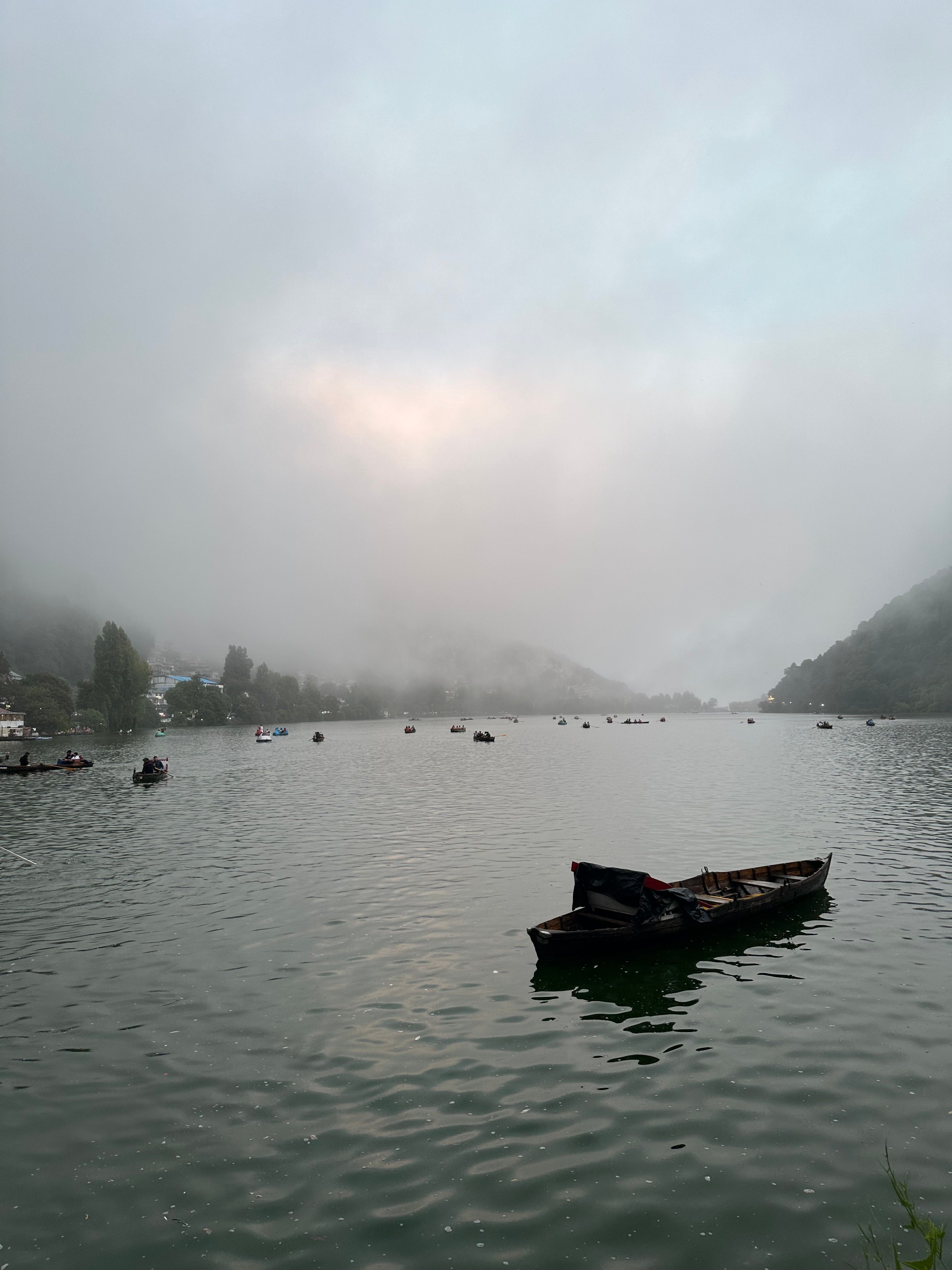 Serene lake view with boat in front