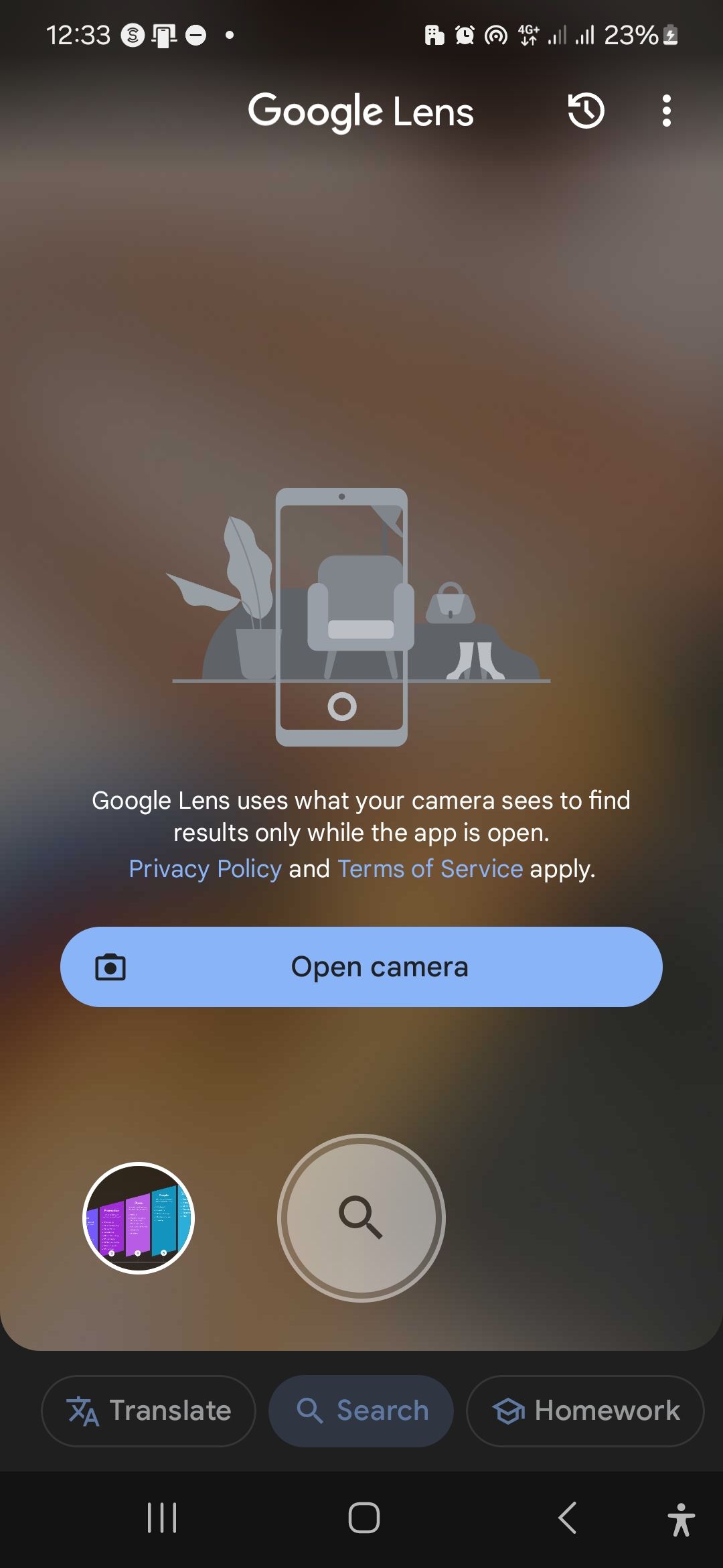 The Google Lens app open on a Galaxy S22 requesting camera permissions