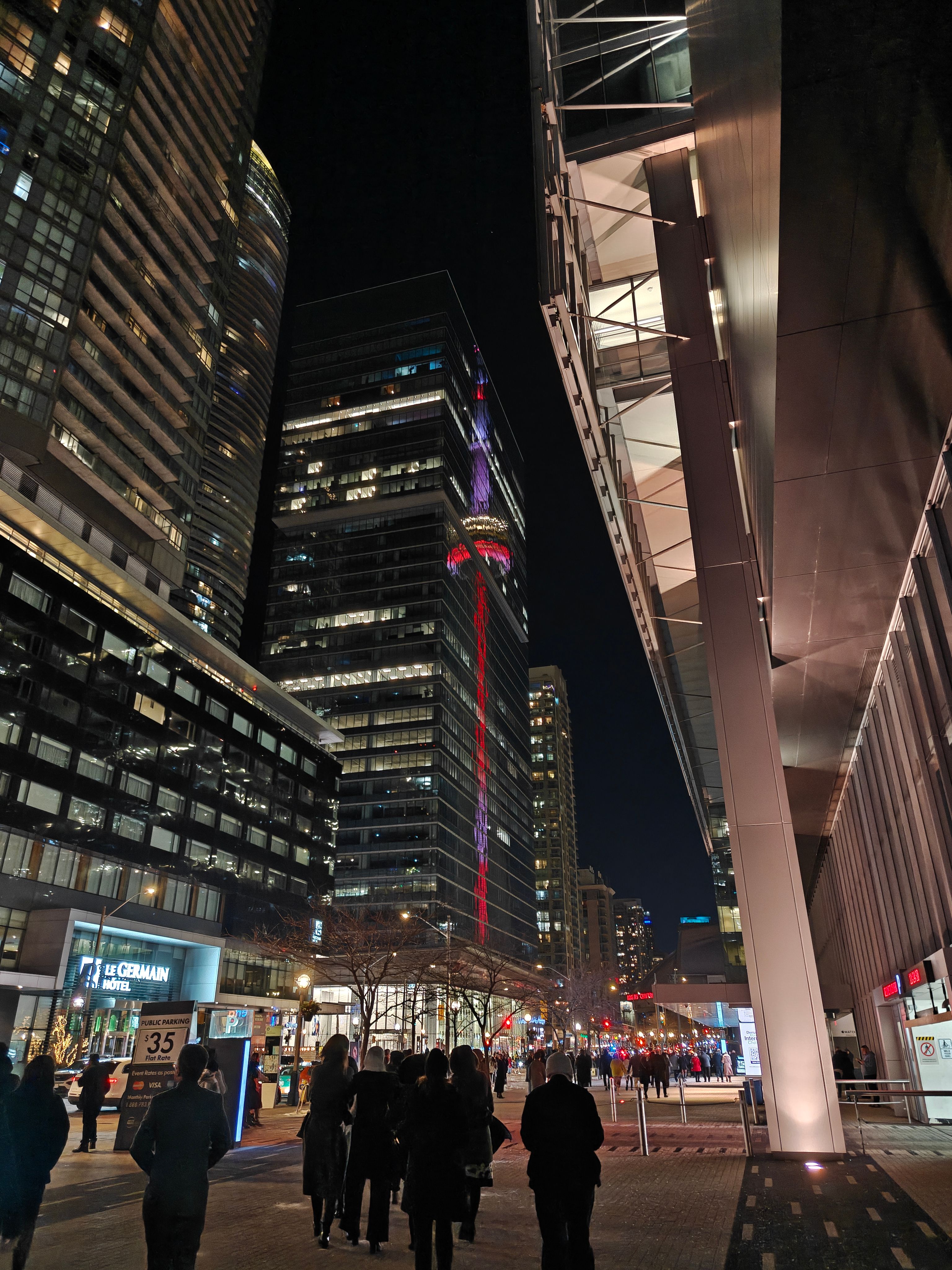 OnePlus 13 wide of reflection of CN Tower at night