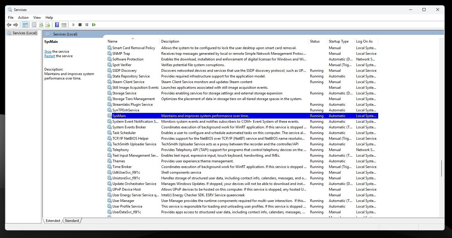SysMain service highlighted in Windows Services. 