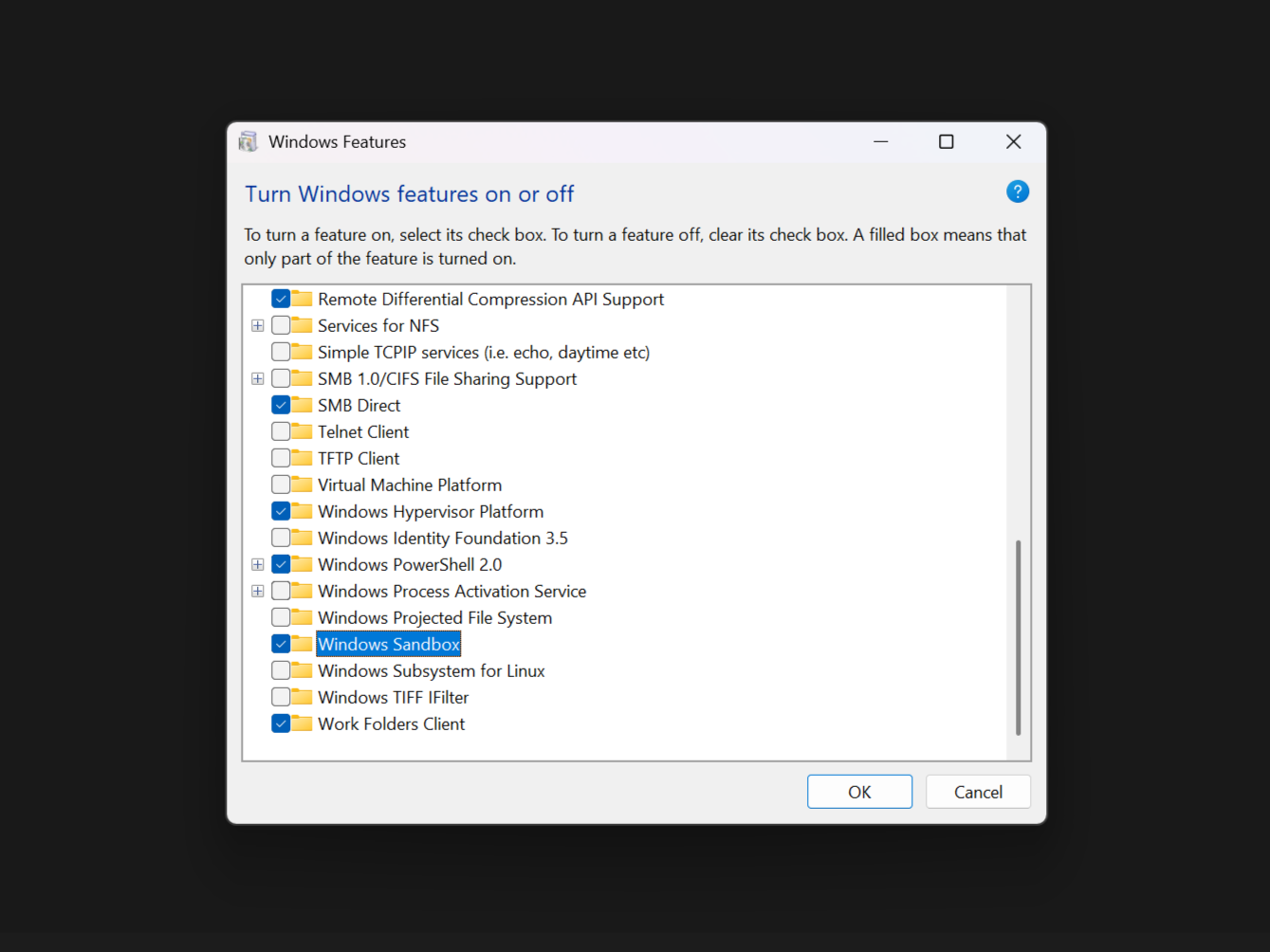 Windows Sandbox highlighted as enabled in Windows features.