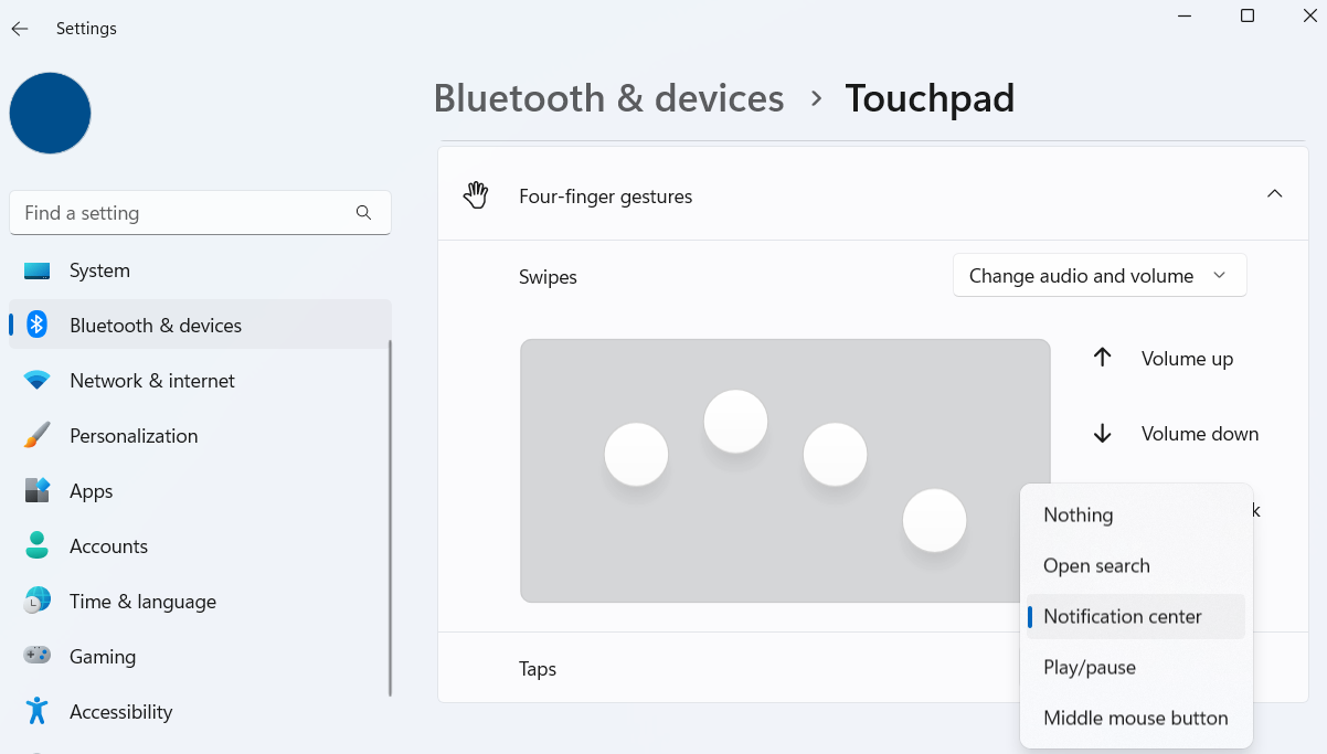 Four finger tap touchpad gesture settings in Windows 11