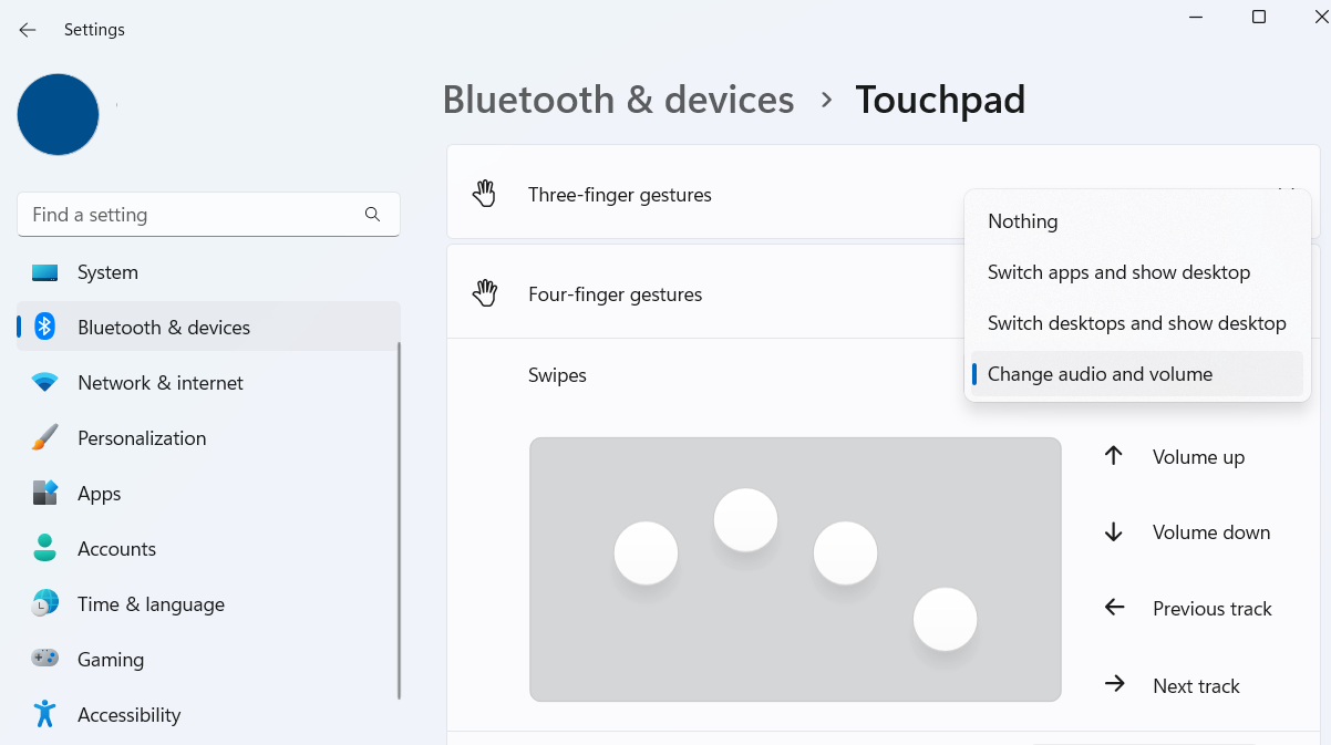 Four finger tap touchpad swipe gesture settings in Windows 11