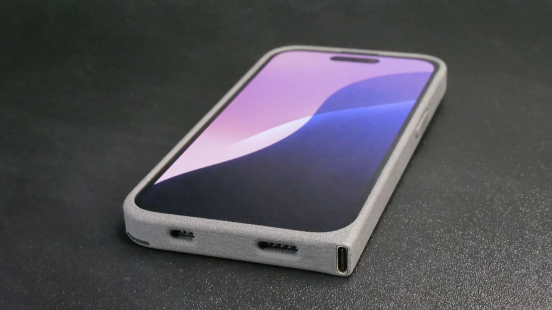 iPhone 14 Pro with USB-C case on a dark surface
