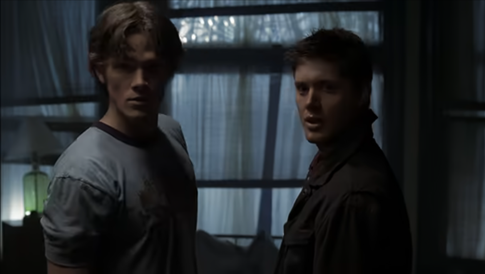 Sam and Dean from Supernatural staring at something off screen