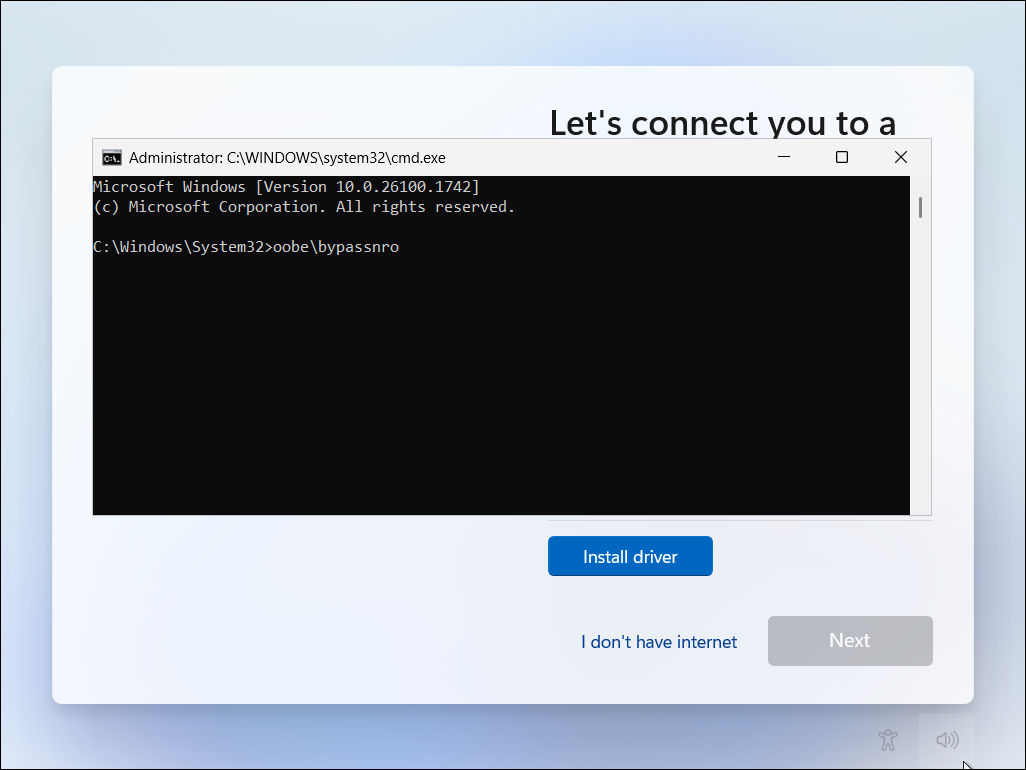 Windows 11 setup screen with command prompt open