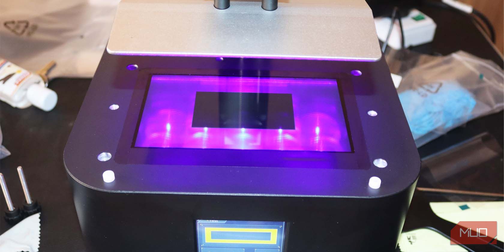 A resin 3D printer with blue lights