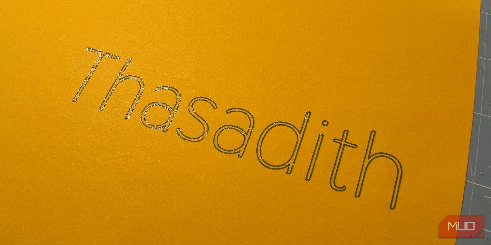 Thasadith font written in gel pen.