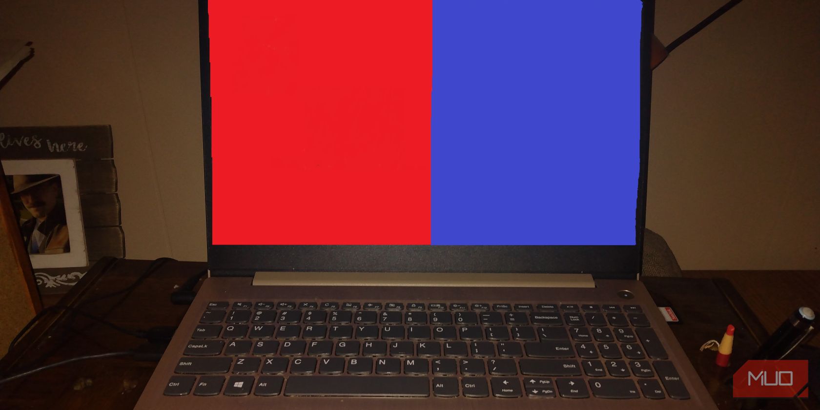 Laptop screen with one half red and one half blue