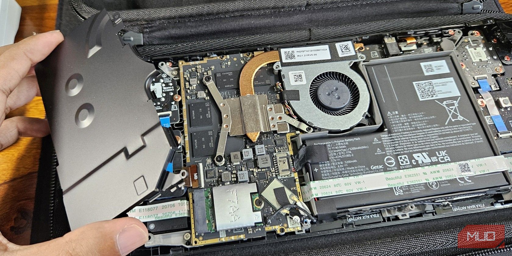 Steam Deck mainboard shield removed to reveal the SOC and SSD