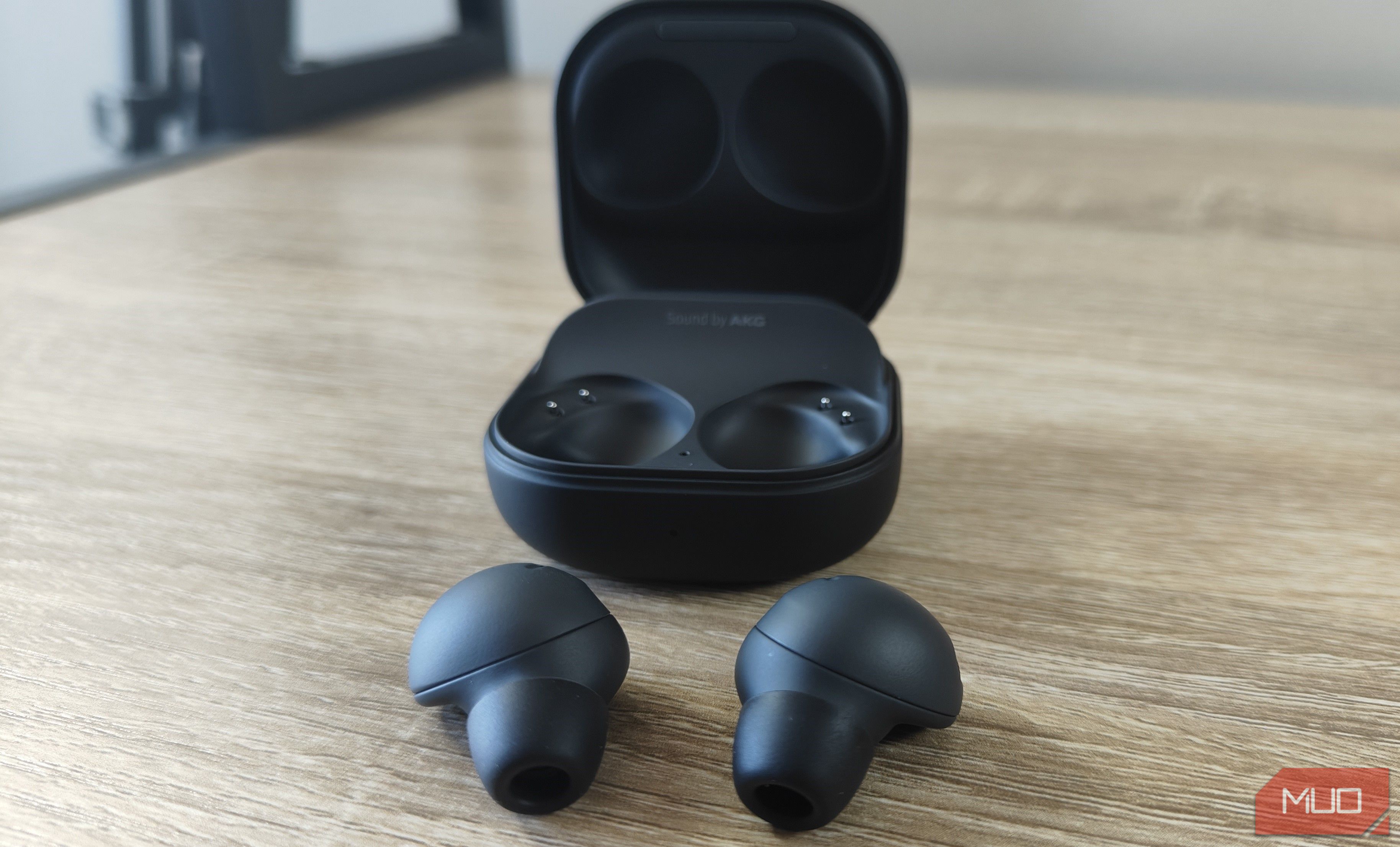 galaxy buds2 pro outside of case on table