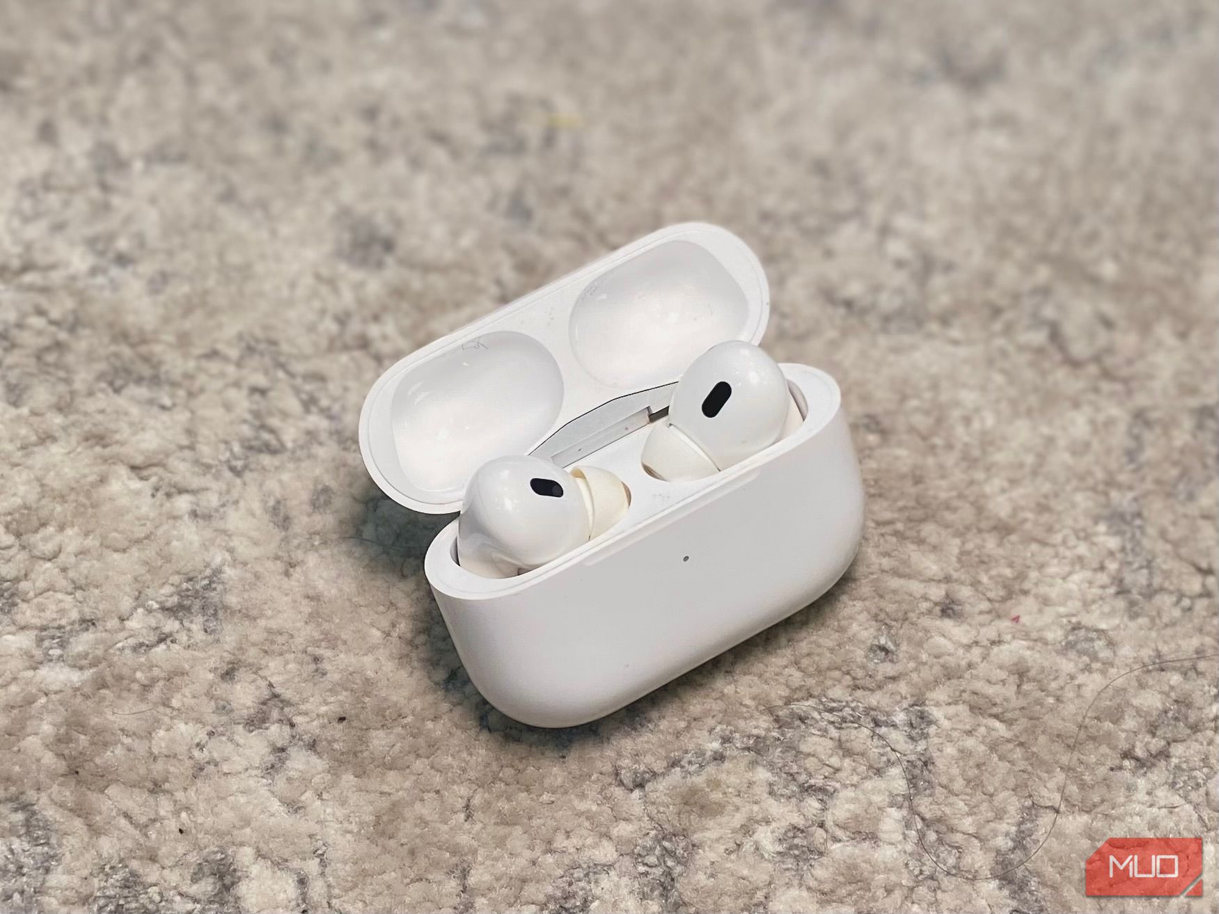 image of airpods on marble countertop