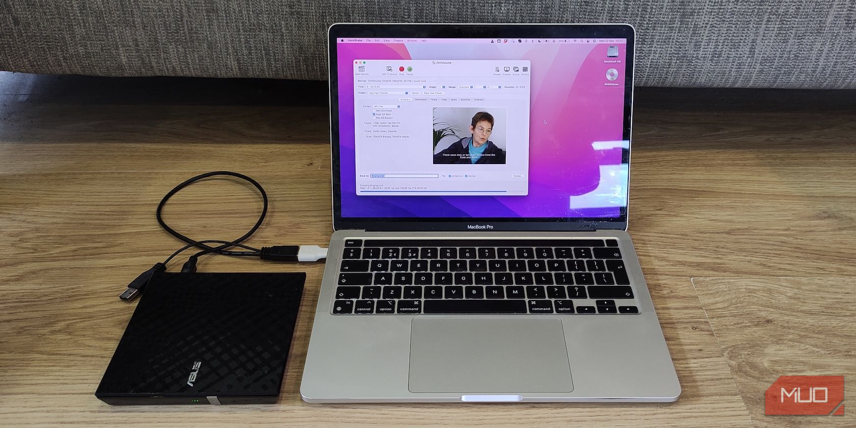 DVD drive connected to MacBook running HandBrake software