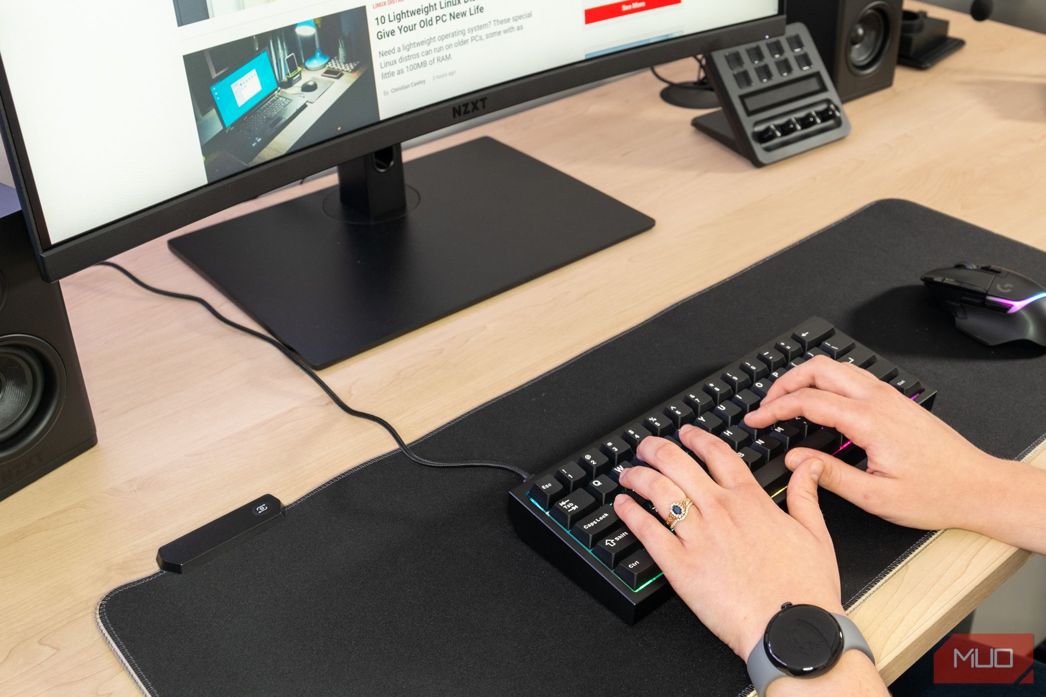 CyberPowerPC CK60 Review - Person using the CyberPowerPC CK60 Gaming Keyboard