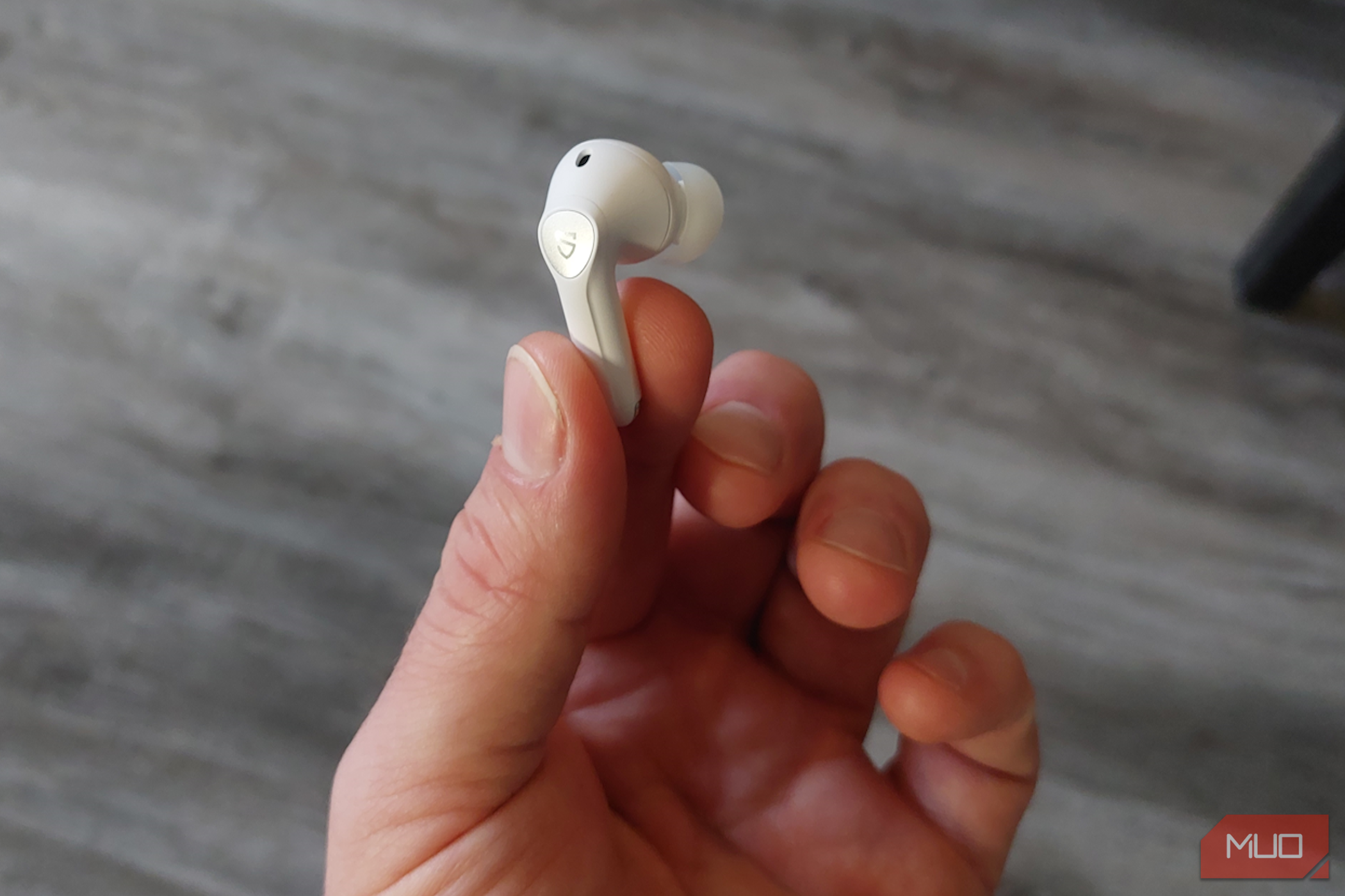 SoundPEATS Air4 Pro earbud in hand-1
