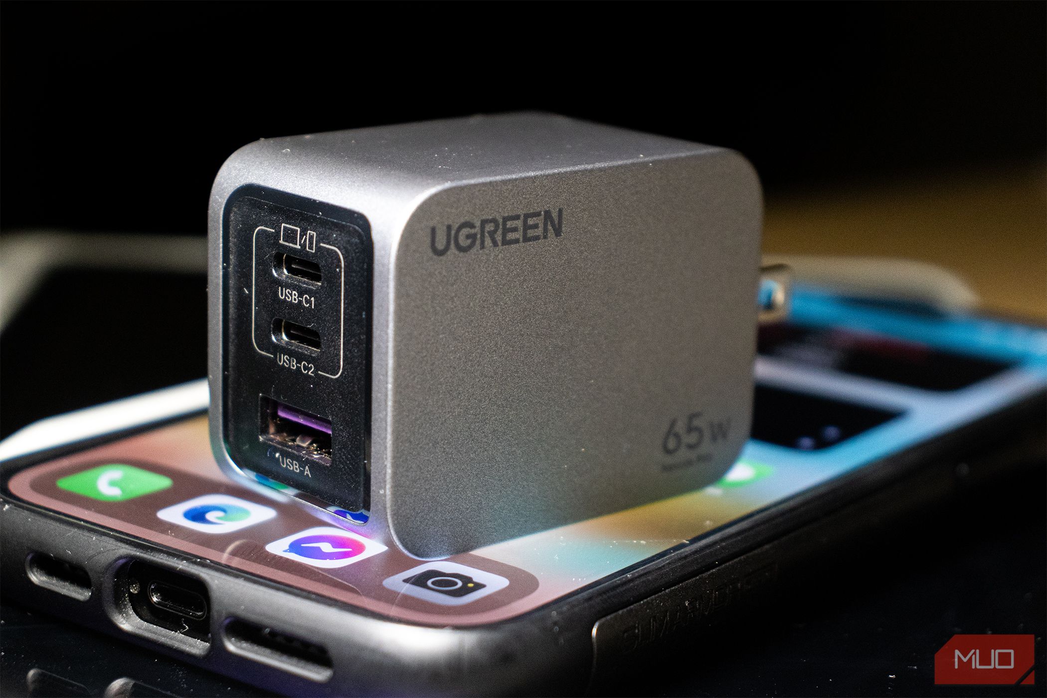 Ugreen Nexode Pro 65W Charger on an iPhone 14 Pro Max