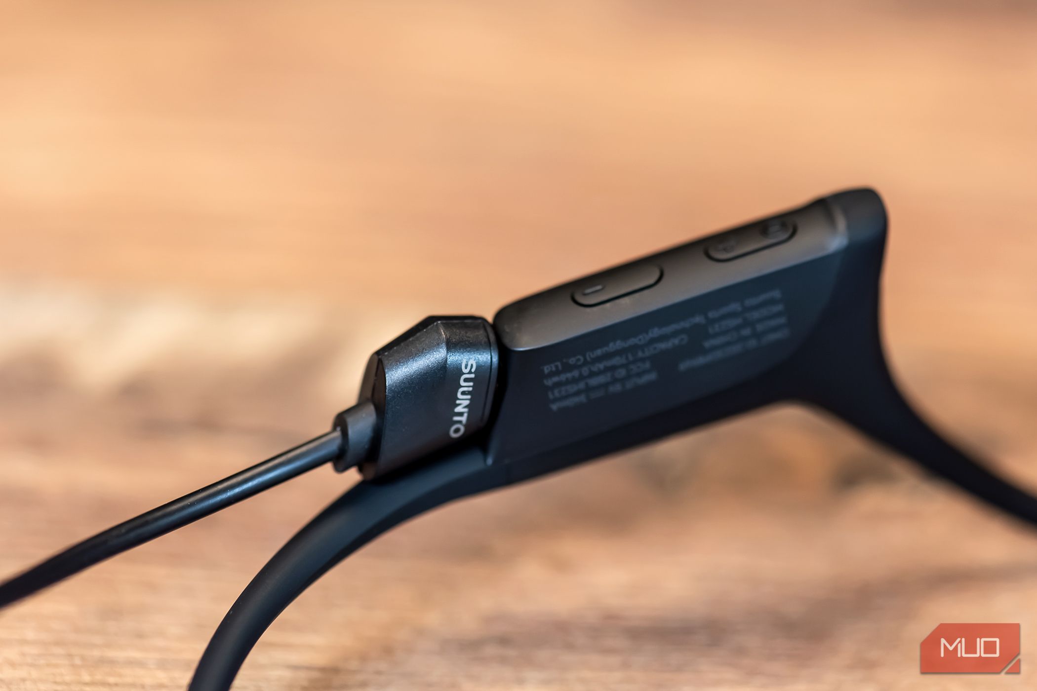 Charging port directly on the SUUNTO Wing Open-Ear Bone Conduction Headphones