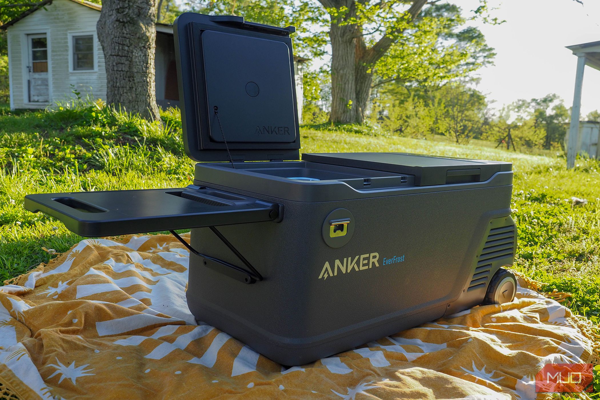 Anker EverFrost Dual-Zone Powered Cooler open on blanket