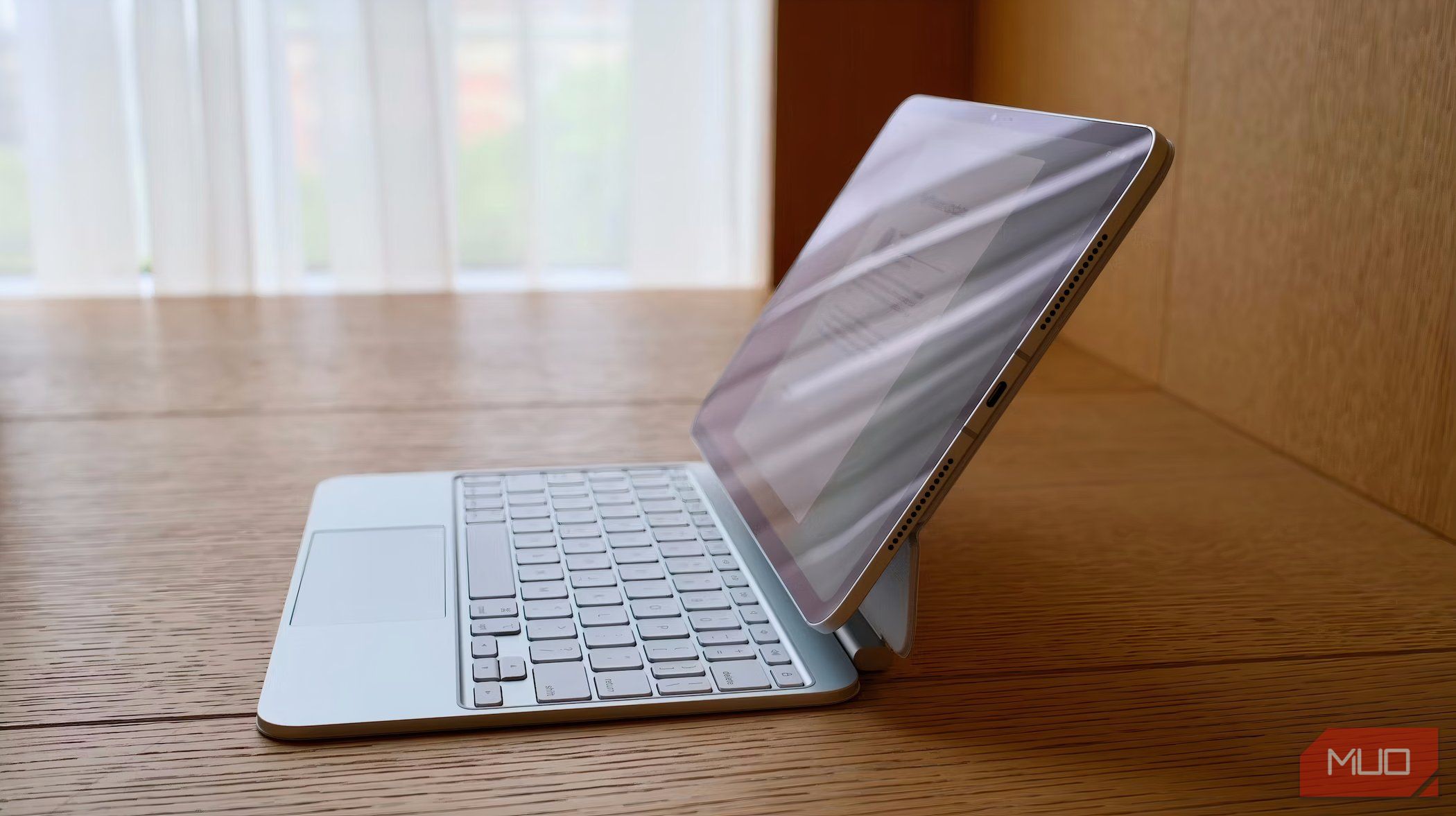 13-inch iPad Pro attached to a white Magic Keyboard on a desk