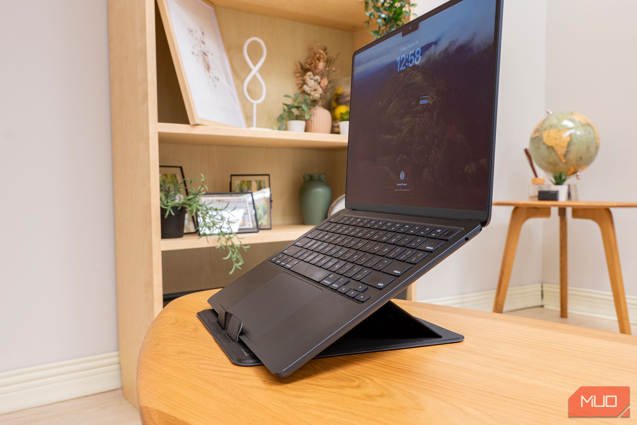 A Macbook on the Plugable PT STANDX Foldable Stand