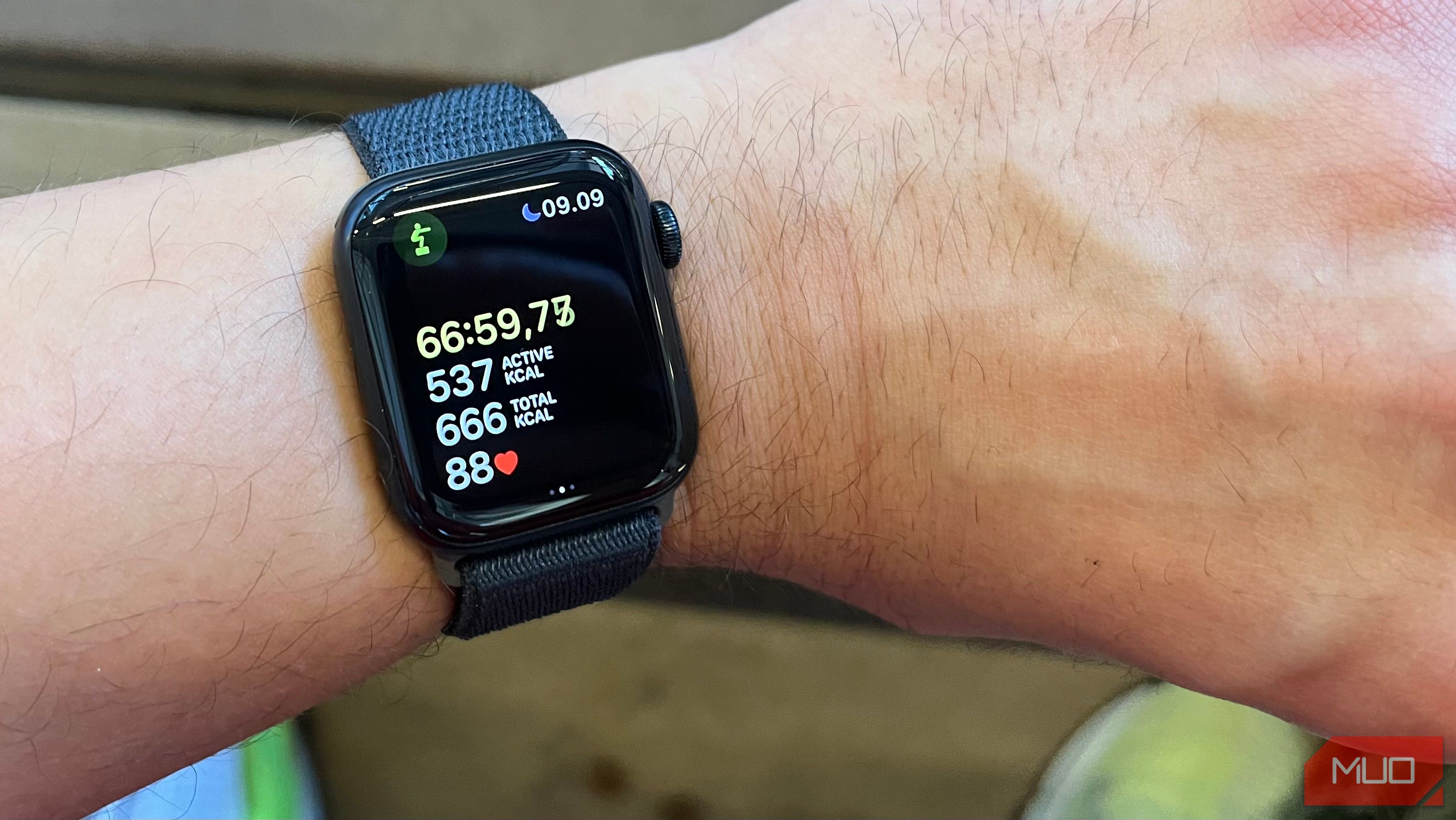 a person looking at their heart rate during a workout on Apple Watch