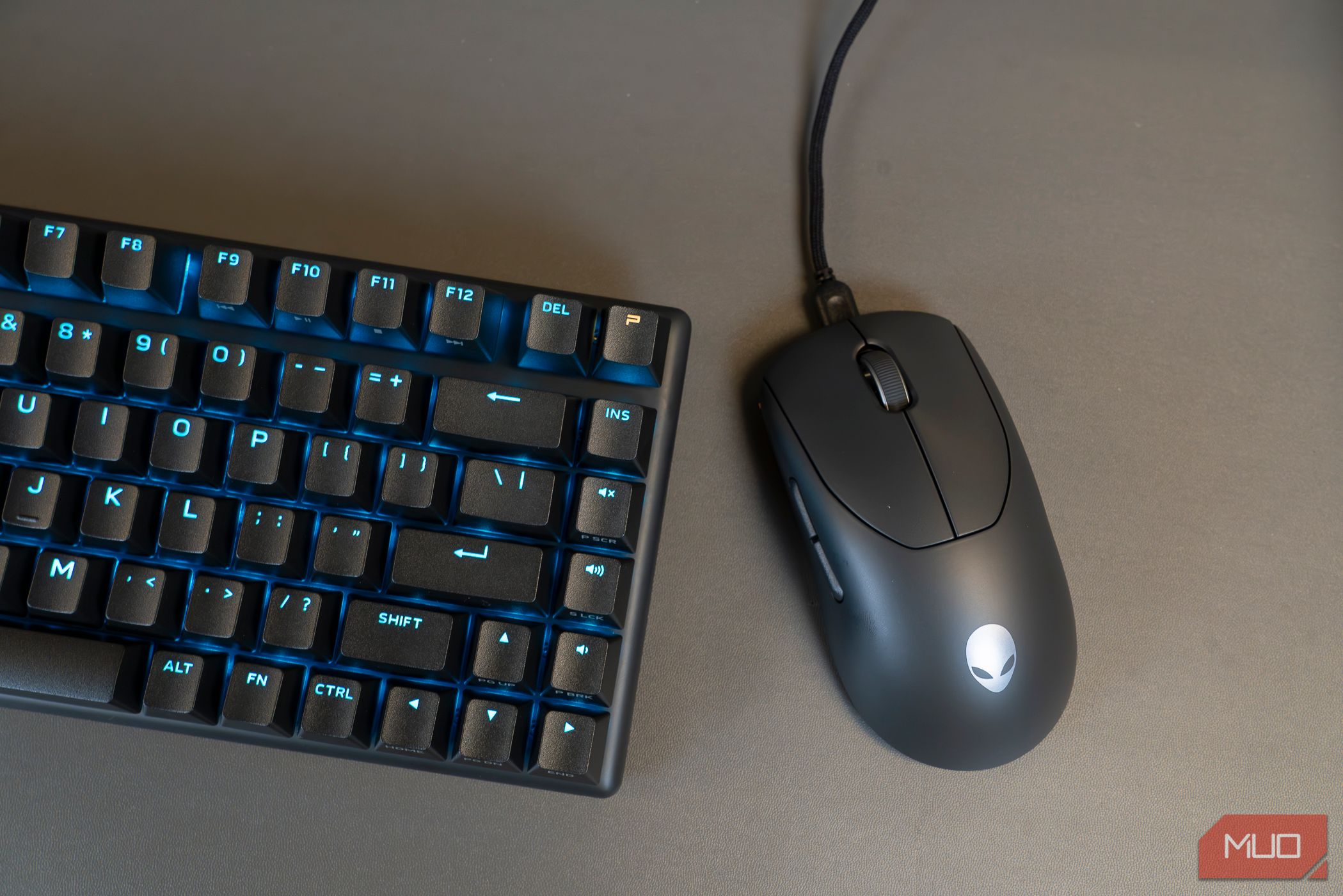 Top view of Alienware Pro wireless gaming mouse next to keyboard