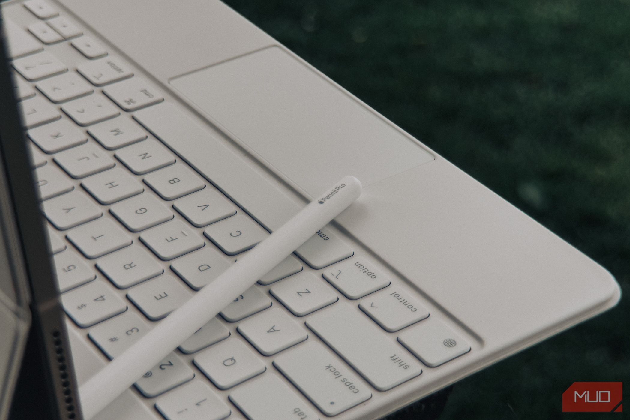 Apple Pencil Pro sitting on the Magic Keyboard