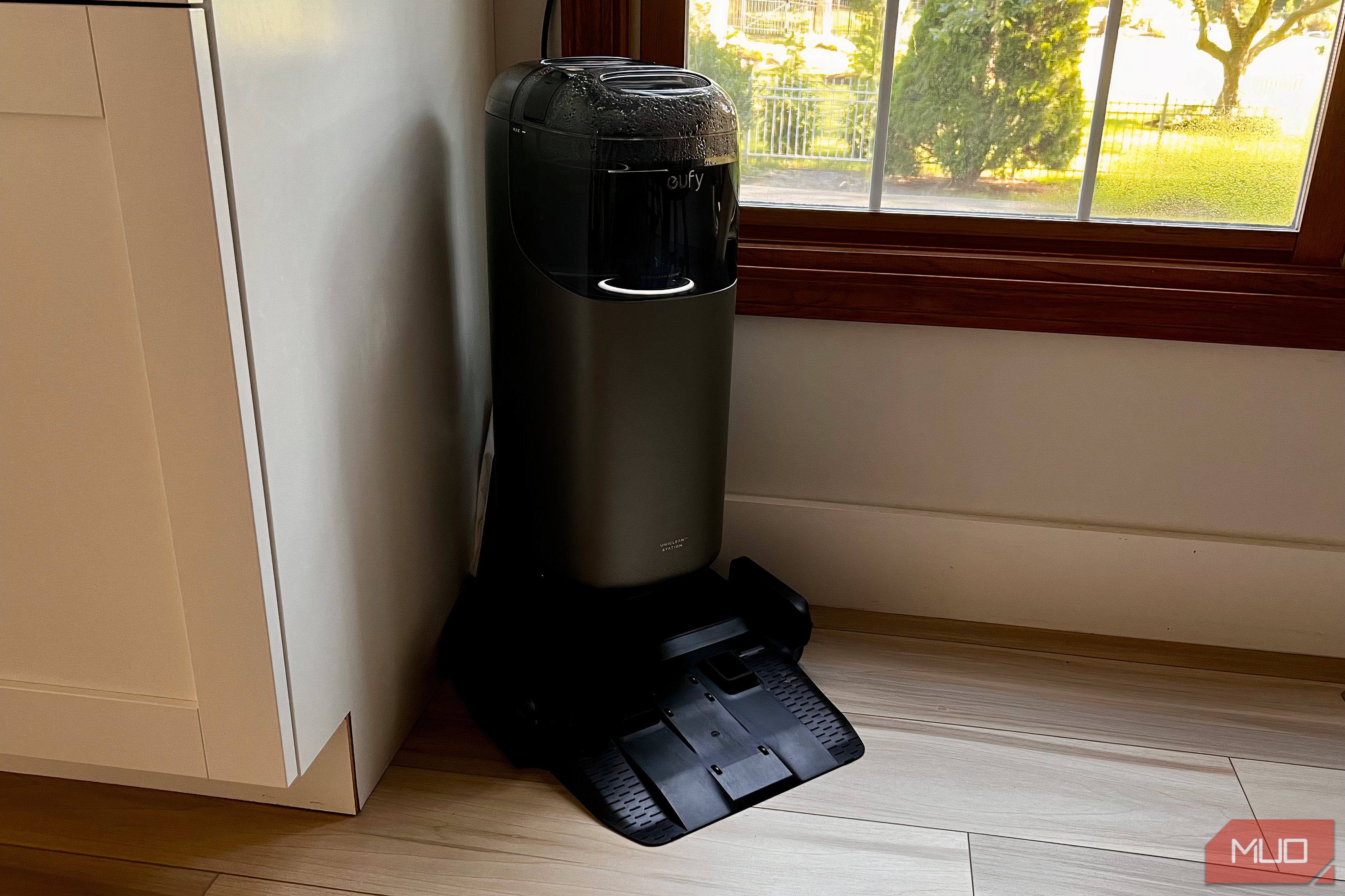 The Eufy Omni S1 Pro charging station positioned in the corner